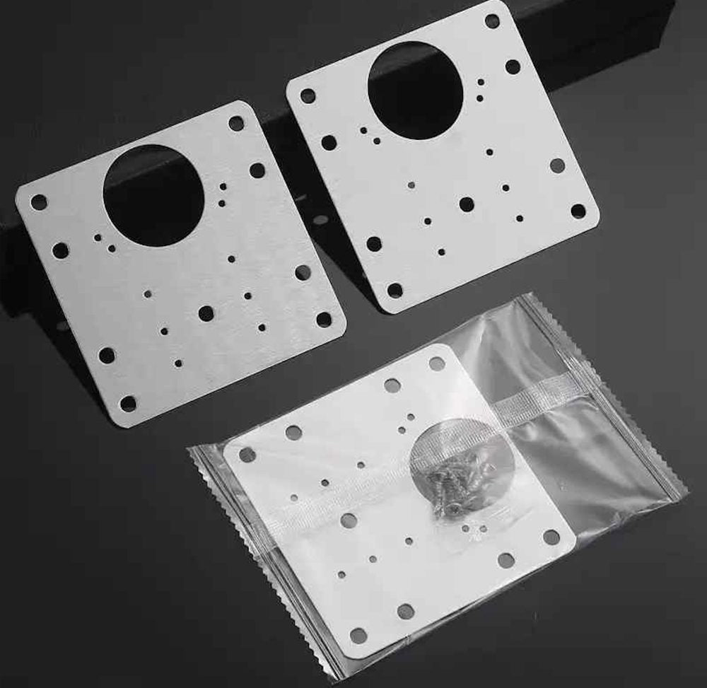 Placas de acero inoxidable del kit con sus tornillos